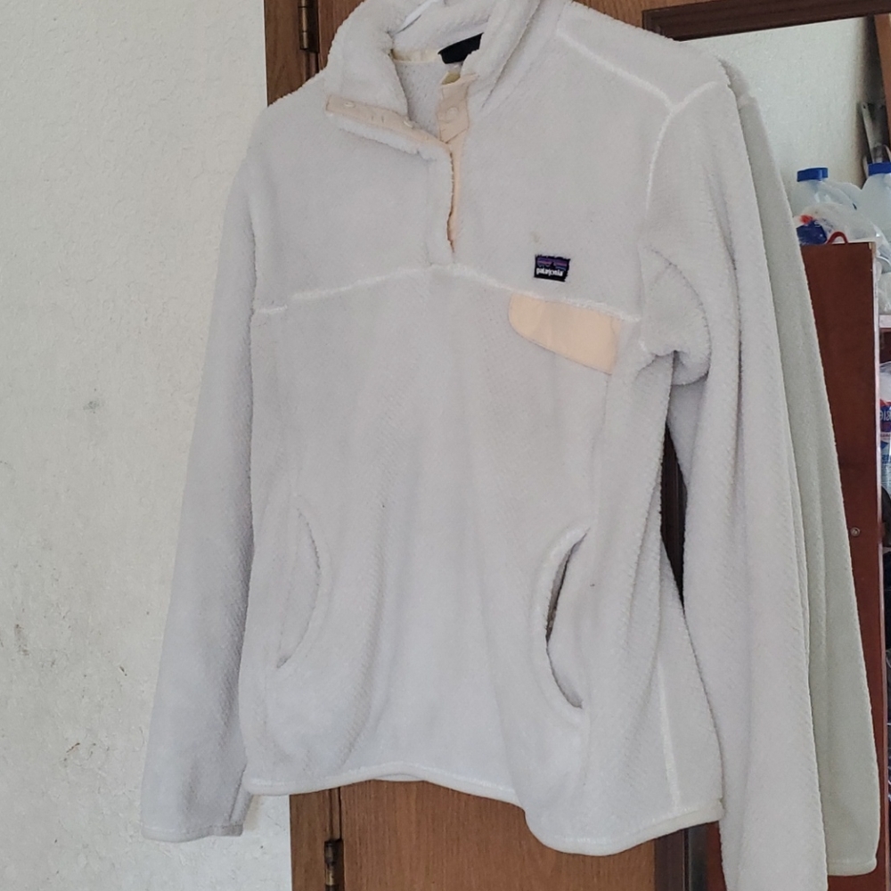 Patagonia sweater white and cream color.